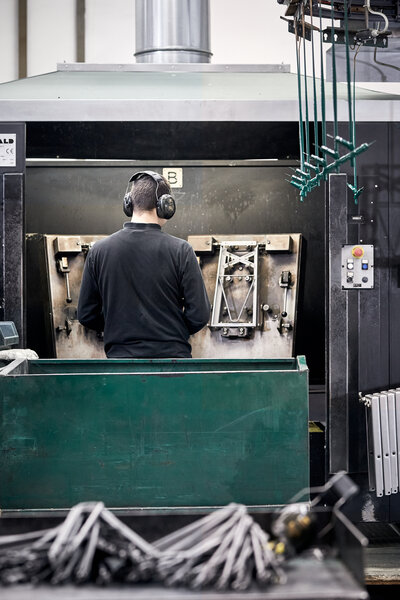A machine used to manufacture the frames for beer tent sets.
