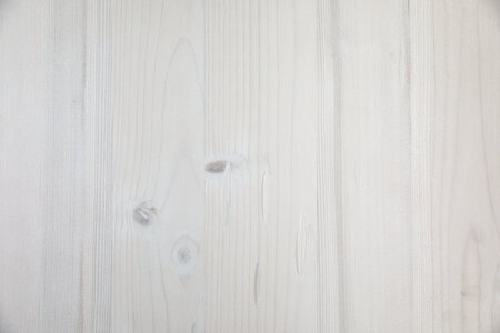 The wooden top of the Riva design set in white.