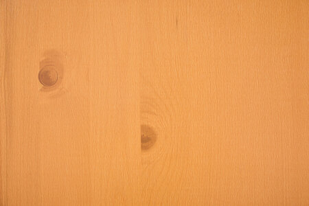 The wooden top of the beer garden table sets in pine.