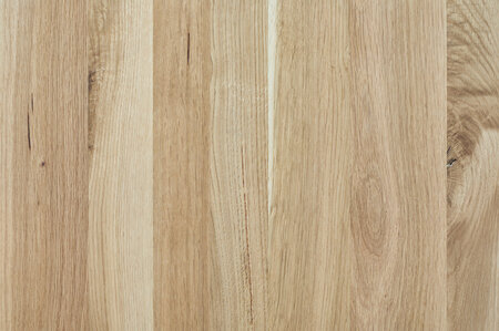 The wooden plate of the design set Lago in oak.