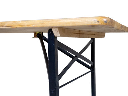 The stacking ledges of the hardware quality beer table set are screwed to the underside.